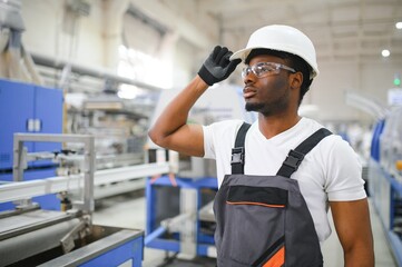 Manual worker assembling PVC doors and windows. Factory for aluminum and PVC windows and doors production