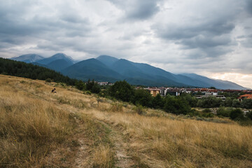 Obraz premium View of Pirin and Bansko at dusk, Bulgaria