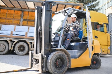 Warehouse man worker with forklift
