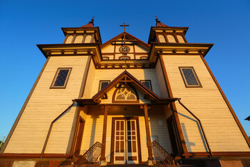 Wooden church at sunrise