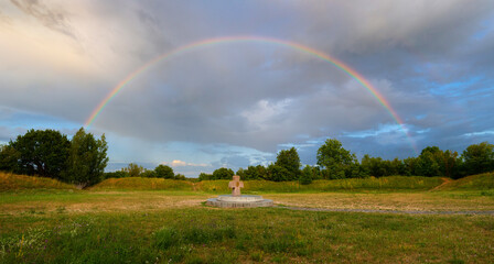 Fototapeta premium Ancient hillfort under rainbow
