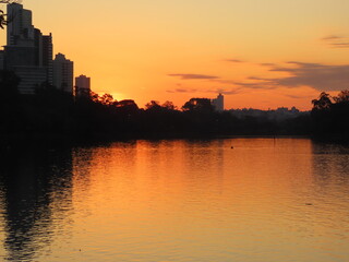 Naklejka premium sunset over the river