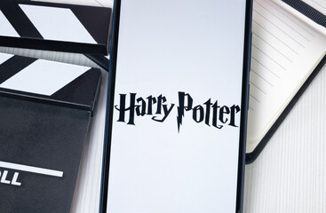 Naklejka premium New York, USA - 30 June 2024: Harry Potter Logo or Icon on Phone Screen