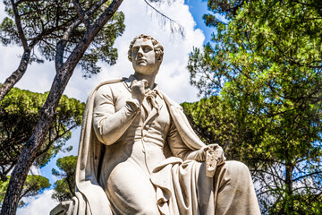 Marble statue of English poet Lord Byron, in the Villa Borghese a landscape garden and public park in Rome, Italy