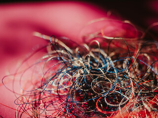 Chaotically tangled threads. Embroidery threads randomly woven. Huge knot. Extreme macro. Beautiful story for intro. Title credits. Abstract screensaver. Handicraft concept, entropy, disorder measure