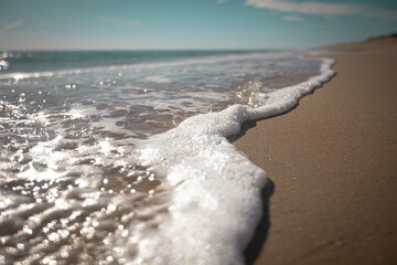 Macro shot of seafoam on the shore of the ocean