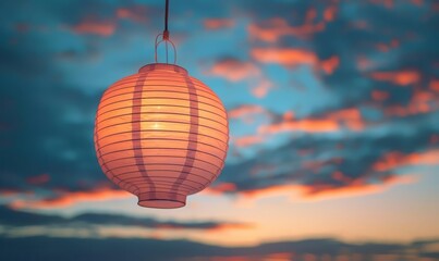 Obraz premium A simple, white paper lantern hanging against a soft, evening sky