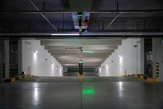 Automatic license plate recognition parking facility in the underground parking lot of a modern building in the city
