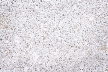 Multicolored polished stone wall light white brown grey background