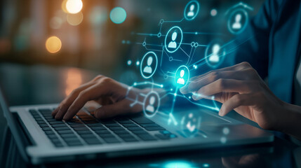 Employee recruitment concept. Someone interacts with a laptop showing a virtual job fair icon for recruiting and onboarding programs, surrounded by a bustling job fair environment with companies