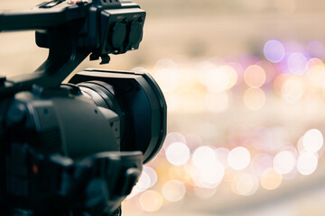 Video camera with blur background for journalist interview broadcasting reporter news or press...