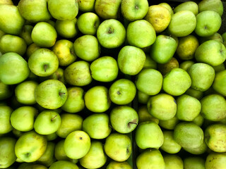 Fresh green apple fruit images. Lot of tasty apples fruits background