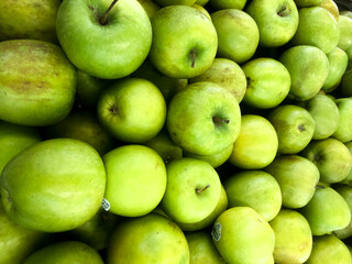 Fresh green apple fruit images. Lot of tasty apples fruits background