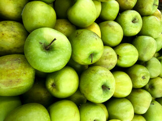 Fresh green apple fruit images. Lot of tasty apples fruits background