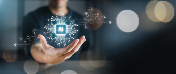 Businessman using artificial intelligence (AI) technology in future business, using artificial intelligence to make business more efficient, IoT, innovation and the future.