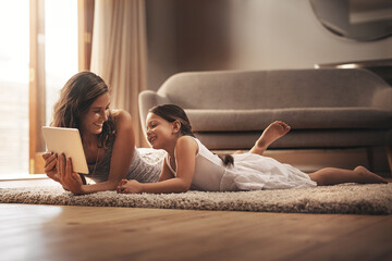 Tablet, happy mom and kid relax in home for learning, education or game. Digital technology, mother...