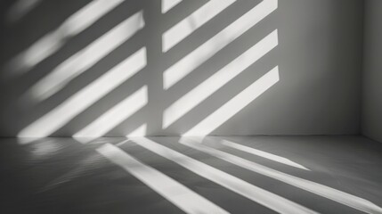 Obraz premium monochrome abstract background with gray shadows and light blur on a white wall, visible through a window.