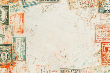 A white page features a border of various passport stamps, each with its own unique design and color palette, arranged in an aesthetically pleasing pattern.