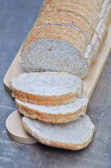  bread , whole wheat bread or sourdough bread or loaf of bread or cranberry and whole grain bread