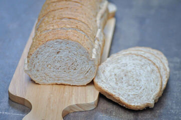  bread , whole wheat bread or sourdough bread or loaf of bread or cranberry and whole grain bread