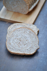  bread , whole wheat bread or sourdough bread or loaf of bread or cranberry and whole grain bread