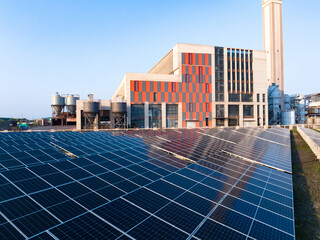 view of solar power panels near chemical plant