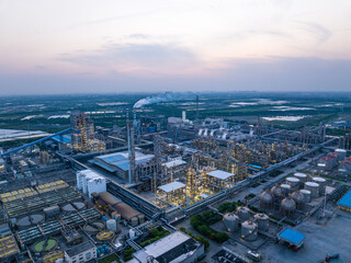 view of petrochemical plant at sunset
