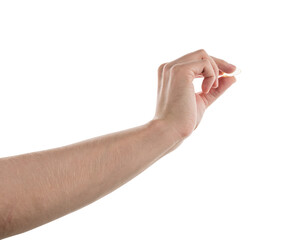 Male hand hold transparent pill isolated on white