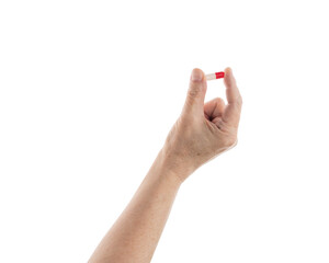 Mid aged female hold red and white pills isolated on white