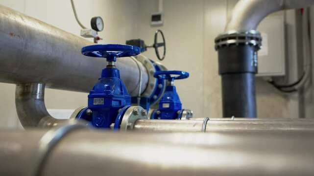 Pipework with levers for supplying cleaning chemicals to sedimentation tanks. System for movement of liquid components inside treatment plant