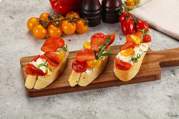 Bruschetta tapas with chorizo and tomato