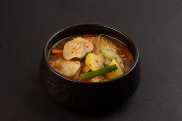 Kimchi Sujebi is Kimchi Hand Torn Noodle Soup.