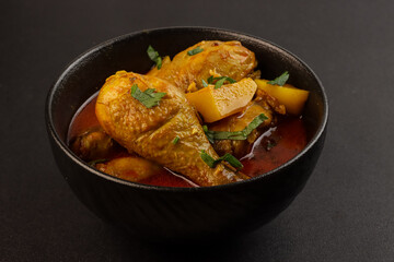 Murgir Jhol or Bengali Chicken Curry is Spicy, delecious and Soupy Chicken Curry With Potatoes.