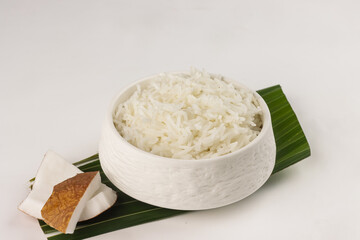 Coconut Rice is Rice Cooked in Coconut Milk. 