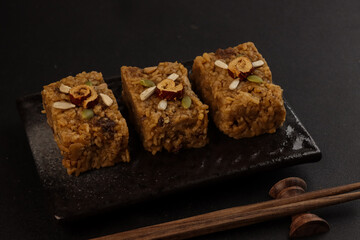Yaksik is Korean Sweet Rice with Dried Fruit and Nuts. 