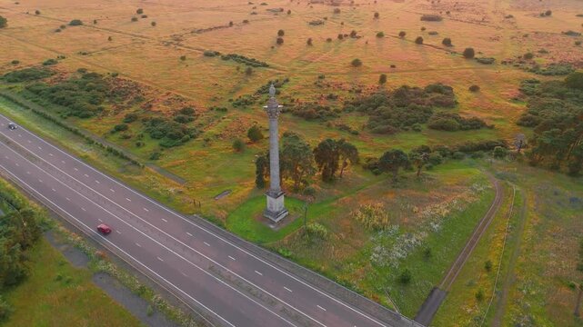 First World War, Elveden War Memorial Along London Road In Suffolk, Eastern England, United Kingdom. Aerial Drone Shot