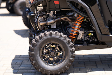 view of parts of the new chassis, frame suspension with wheel of the suv © Vadim