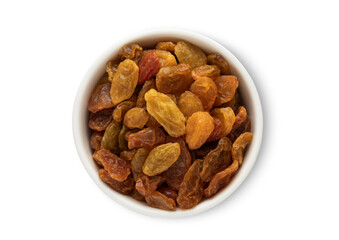 Ceramic bowl with sweet large yellow organic raisins made from green grapes isolated on white background.Top view.