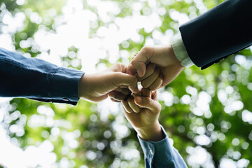 World environment day with global community teamwork, A group of volunteer, business joins hands...