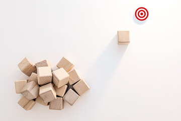 Pile of Wooden Blocks with Single Block and Red Target on White Background. Leadership and...