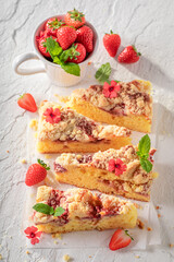 Sweet and homemade strawberry cake made of fresh fruits.