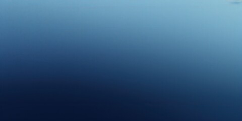 Obraz premium Deep Blue Ocean Water Surface with Subtle Gradient from Light to Dark Blue
