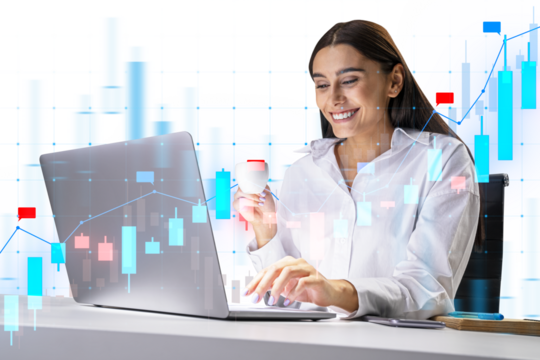 A businesswoman analyzing financial graphs on a transparent futuristic interface, with a laptop in front of her on a white background. Concept of modern finance analysis