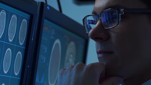 Professional medical doctors working in hospital office making computer research. Medicine, healthcare and technology concept.