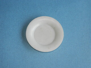 Macro photo of children's cooking toys with a blue background