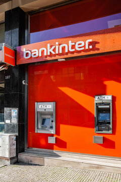 Vila Nova de Famalicao, Portugal - December 23, 2023: Bankinter bank with an exterior Multibanco aka ATM machine terminal managed by SIBS, with brand logo, sign or symbol of Bankinter