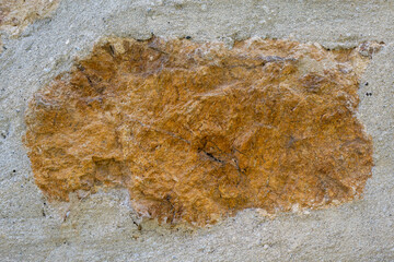 Gray-yellow stone background.