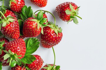 A close-up shot of fresh strawberries with green leaves, showcasing their intricate details and vibrant colors against a clean white surface. Perfect for food bloggers and fruit enthusiasts!