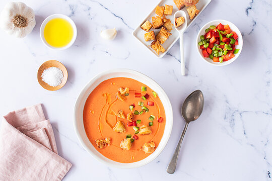 Top view of Tomato Gazpacho Soup with fresh ingredients