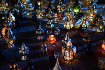 Colorful Moroccan lanterns displayed at night in Marrakesh